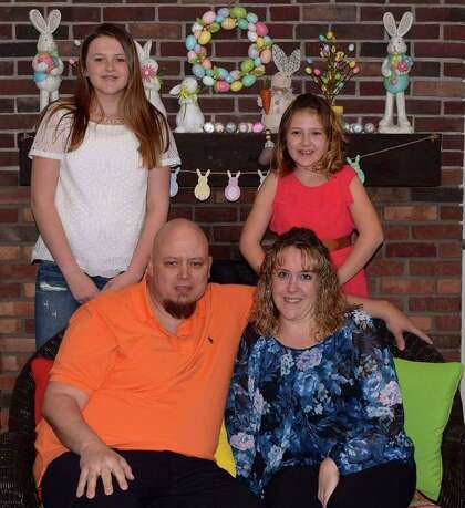 Henry Maikowski with his wife, Kiersten Terribile, and their daughters, Alyssa, left, and Amber.