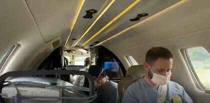 A medical team travels to obtain a heart for transplant.