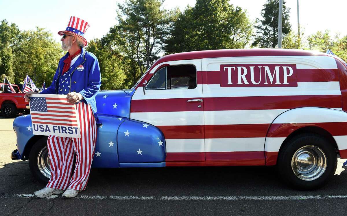 Enthusiastic crowd floods Guilford for Trump Car Parade