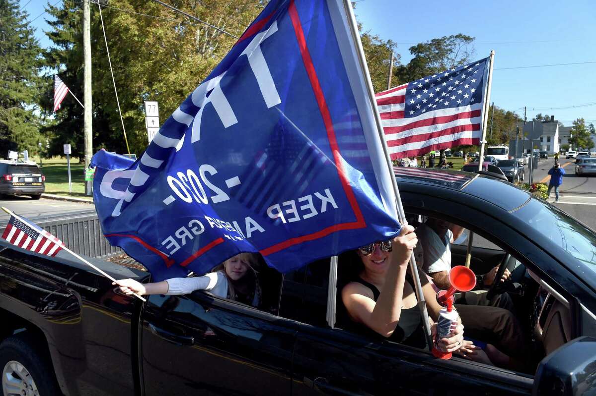 Enthusiastic crowd floods Guilford for Trump Car Parade