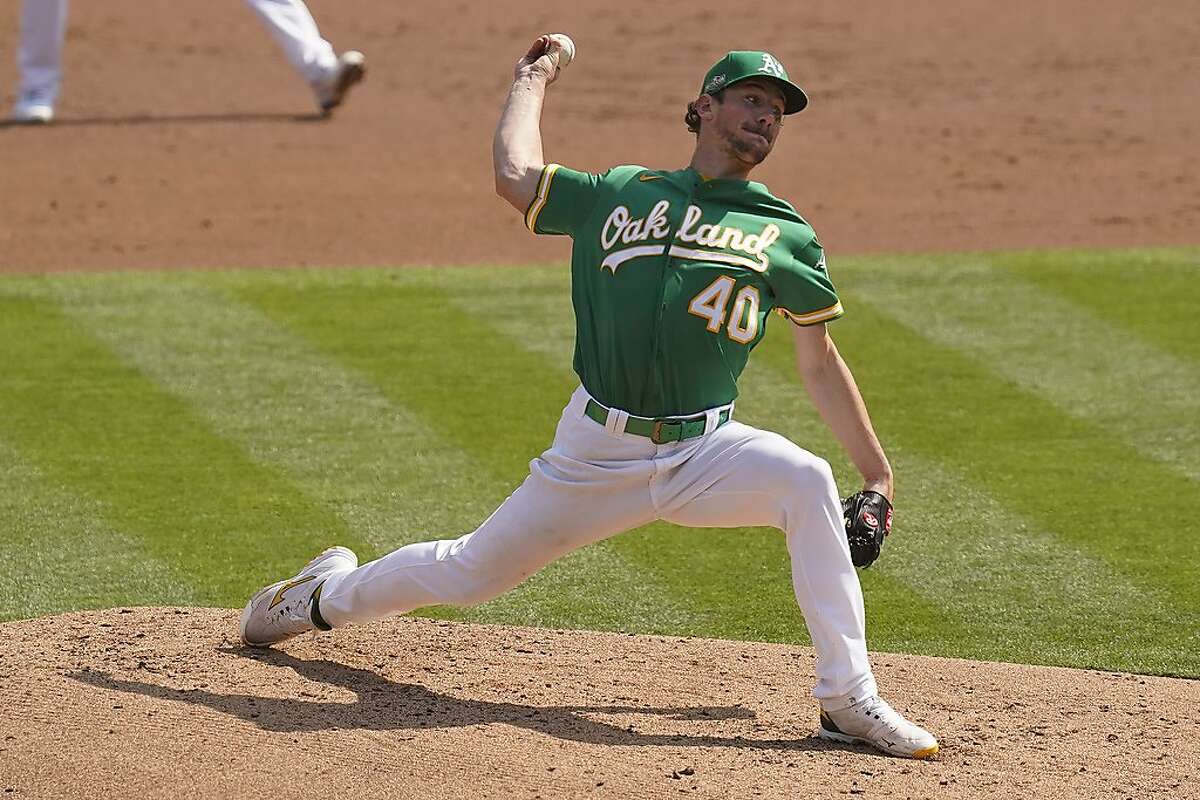 Oakland Athletics' Chris Bassitt (40) pitches against the Chicago White Sox during the second inning of Game 2 of an American League wild-card baseball series Wednesday, Sept. 30, 2020, in Oakland, Calif. (AP Photo/Eric Risberg)