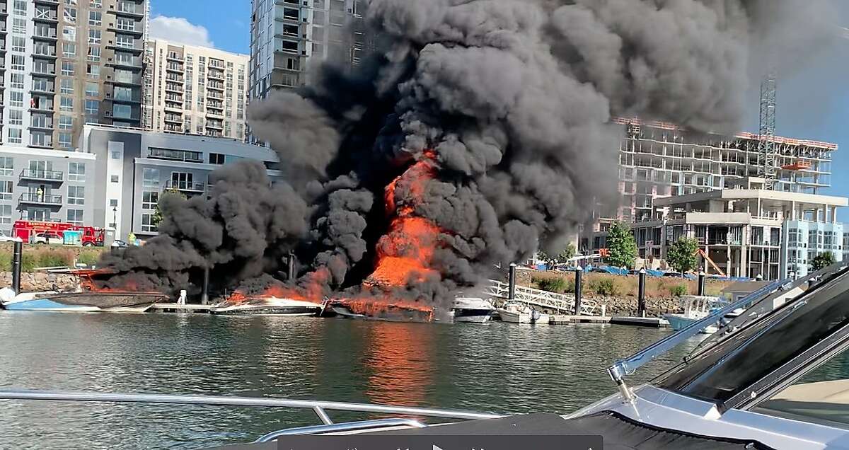 Peter Adler of Darien captured this image of flames consuming boats, a tiki bar and a dock in Stamford Saturday afternoon, Oct. 3.