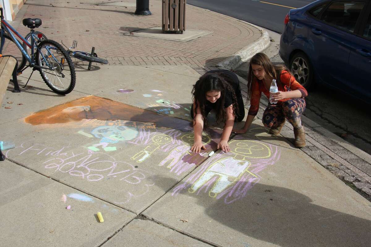The Bad Axe Area District Library held its first Chalk Fest on October 3, an event open to all ages where participants demonstrated their chalk art skills from 1:30-3:30 pm along Huron Avenue. Cash prizes for the event were from the library's Lynda Pietscher memorial fund, which funds many art programs for kids.