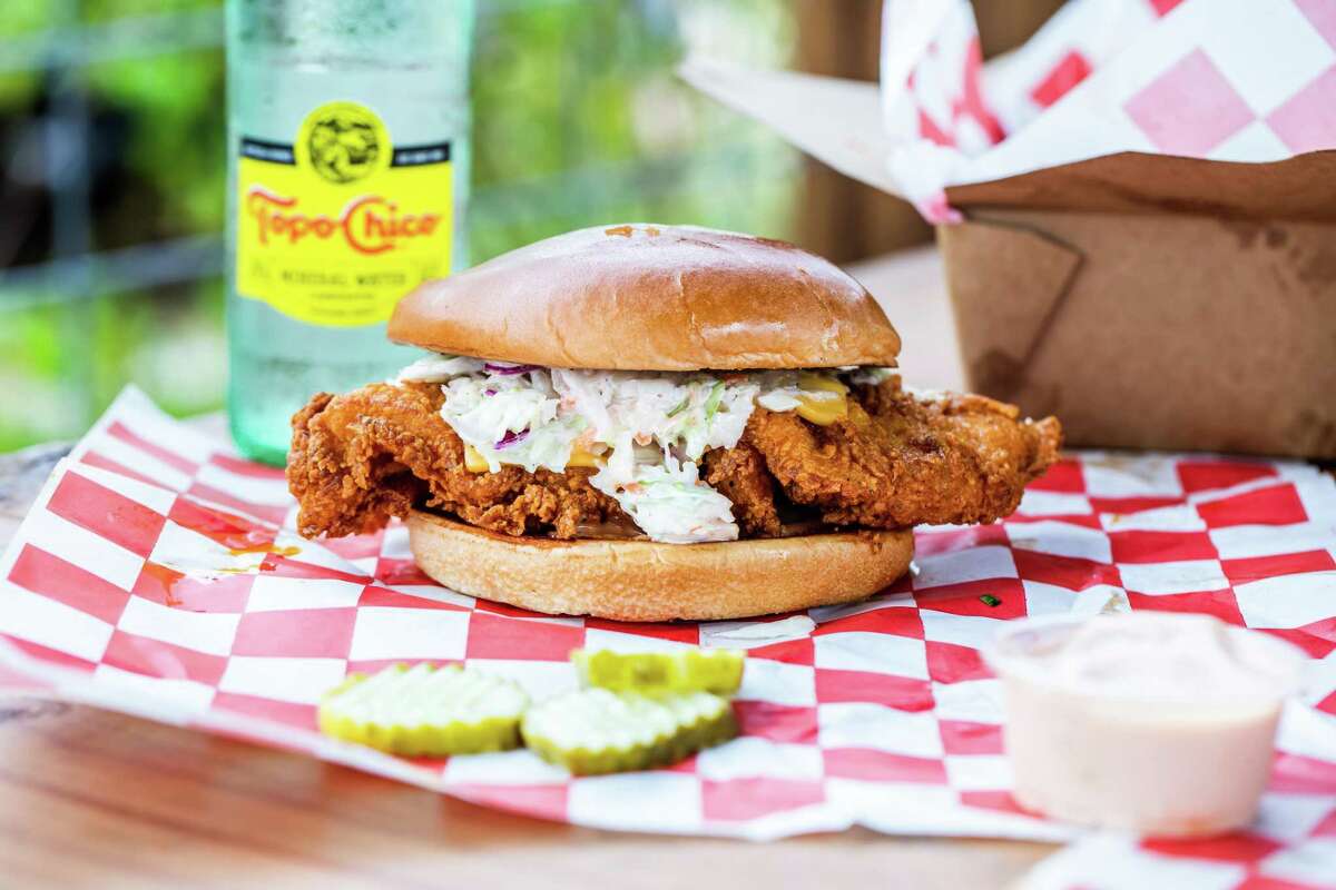 Nashville-inspired fried chicken breast sandwich with house-made coleslaw and pickles on a brioche bun at Mico's Hot Chicken.