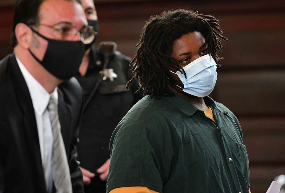 Jahquay Brown, right, stands next to Assistant Public Defendant Greg Cholakis as he is arraigned for second-degree murder in the killing of 11-year-old Ayshawn Davis at the Rensselaer County Court House on Monday, Oct. 5, 2020 in Troy, N.Y. (Lori Van Buren/Times Union)