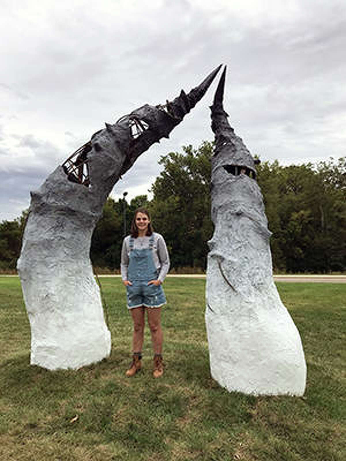 SIUE’s Abbi Ruppert stands by her installed sculpture “Revival.”