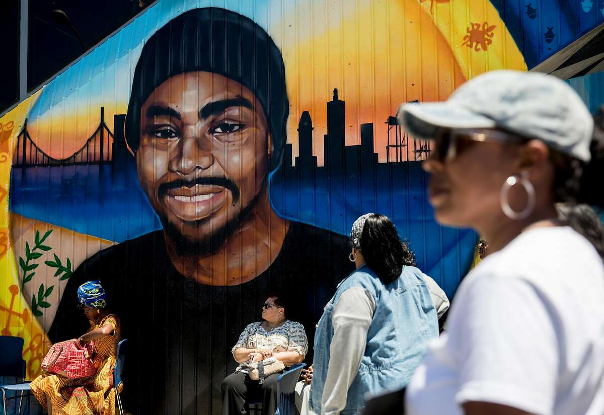 A large mural honoring the late Oscar Grant is seen on the side of Fruitvale BART Station during a mural and street naming unveiling in Oakland, Calif. Saturday, June 8, 2019. Alameda District Attorney Nancy O’Malley said Oct. 5 that her office intends to reopen Grant’s case.
