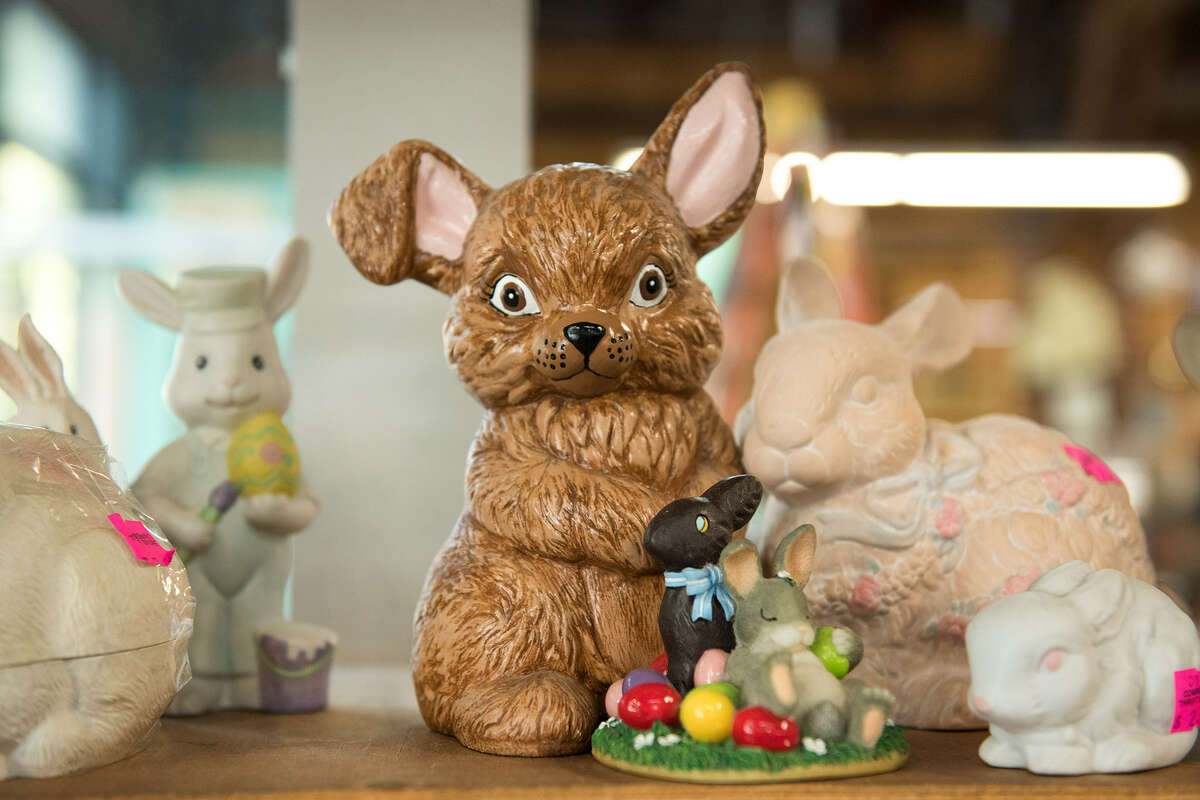 Retro rabbit figurines are displayed for sale at Community Thrift.