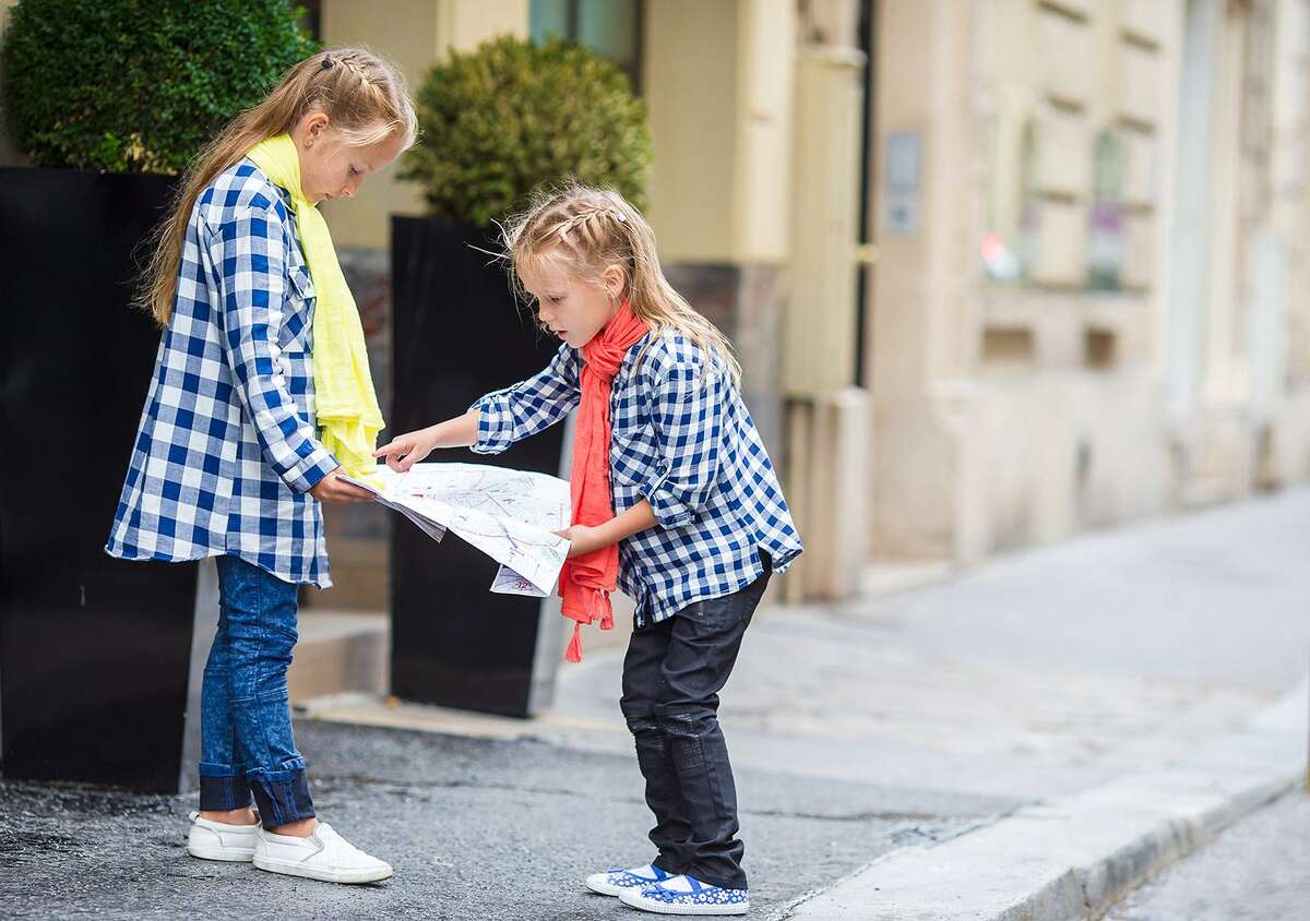 Two Fairfield children participate in the town's family scavenger hunt contest.