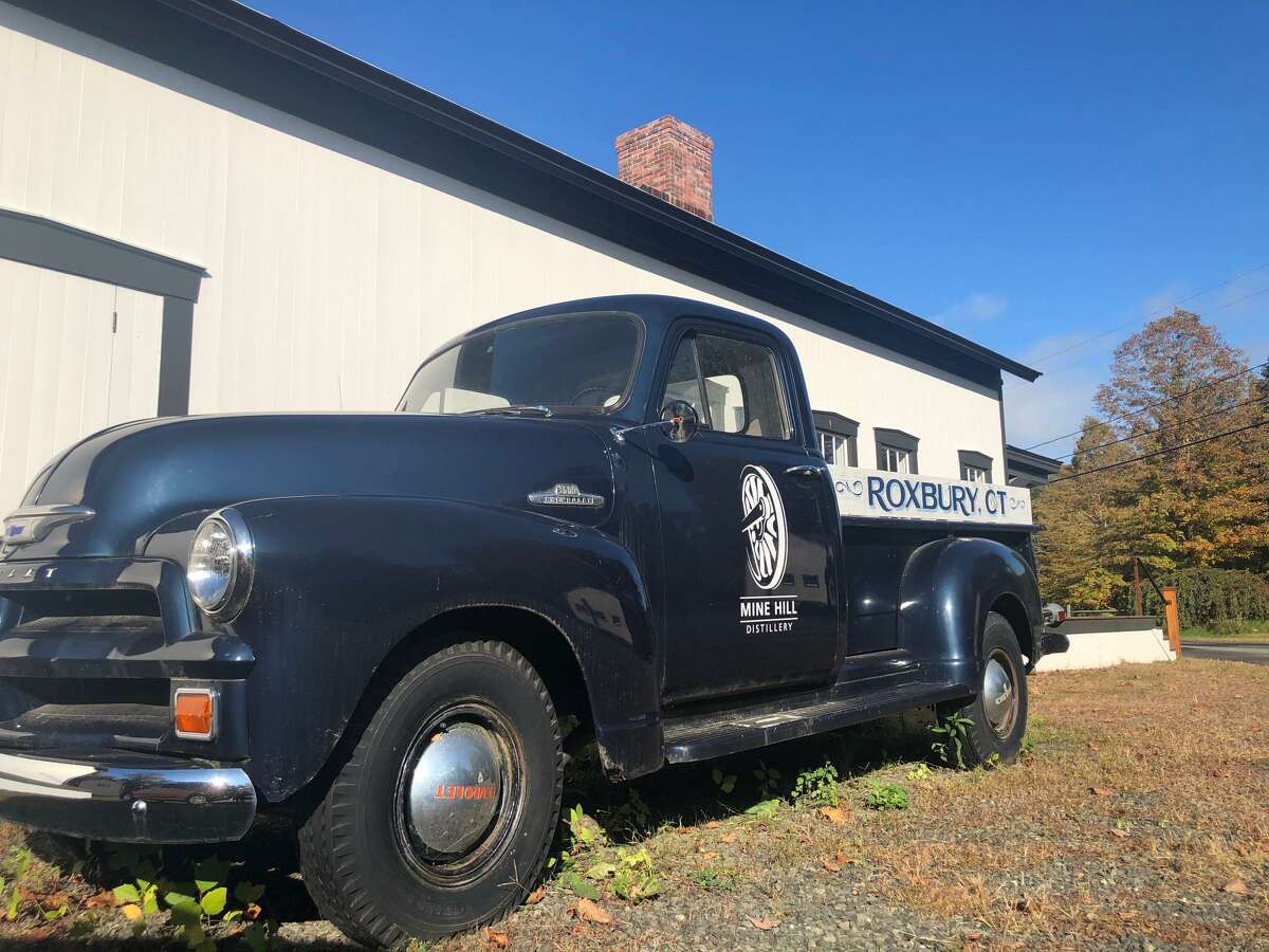 Mine Hill Distillery, one of the businesses local in Roxbury's business district, proudly displays the town's name.