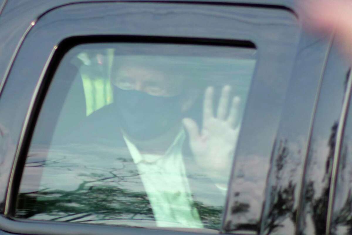 President Donald Trump drives past supporters gathered outside Walter Reed National Military Medical Center Sunday, where Trump was undergoing treatment for COVID-19. Readers are less than impressed.
