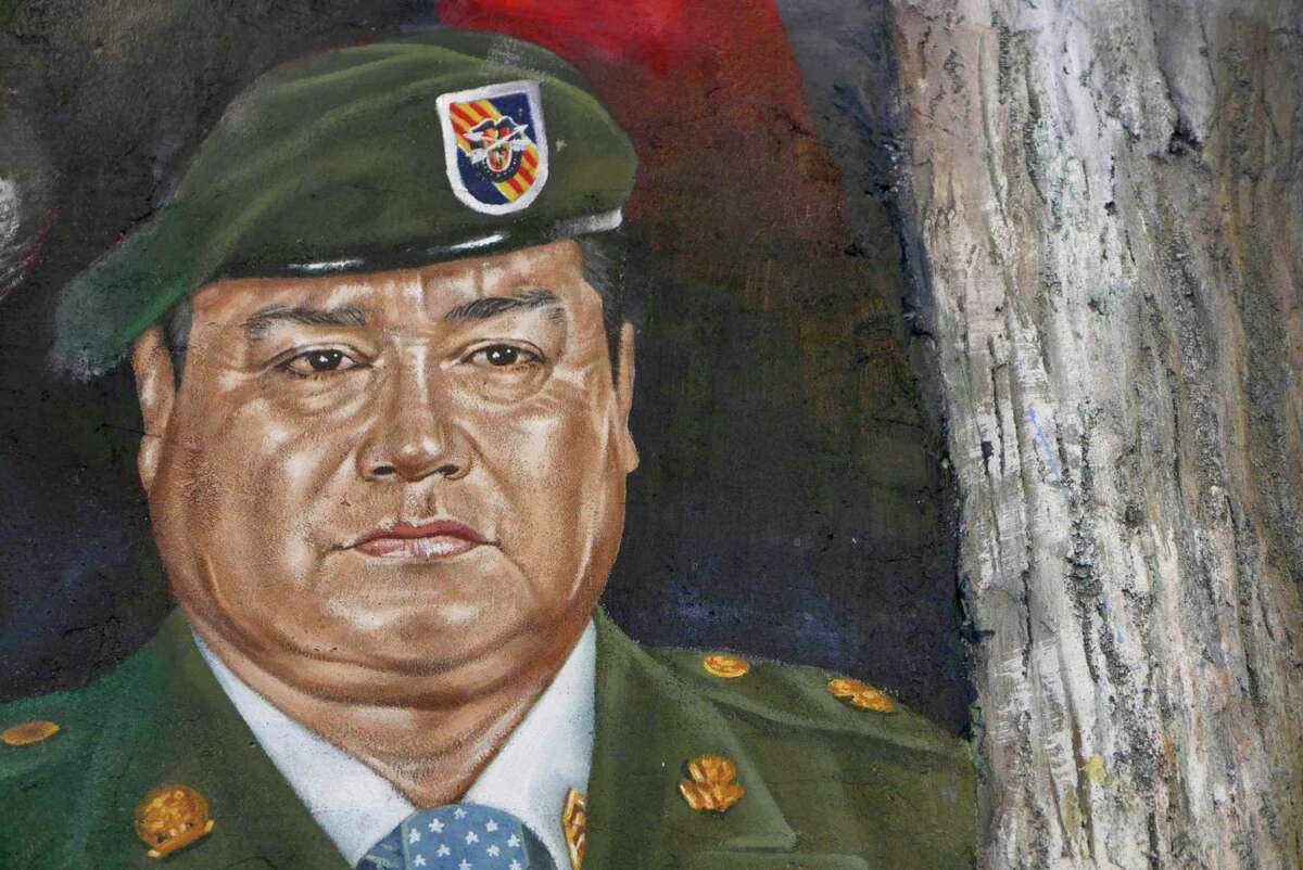 A mural of Master Sgt. Roy P. Benavidez, who won the Medal of Honor for action in the Vietnam War, watches over Mi Tierra in downtown San Antonio.