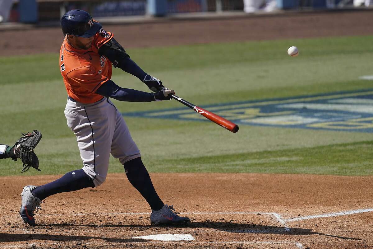 Houston Astros' George Springer celebrates his leadoff home run