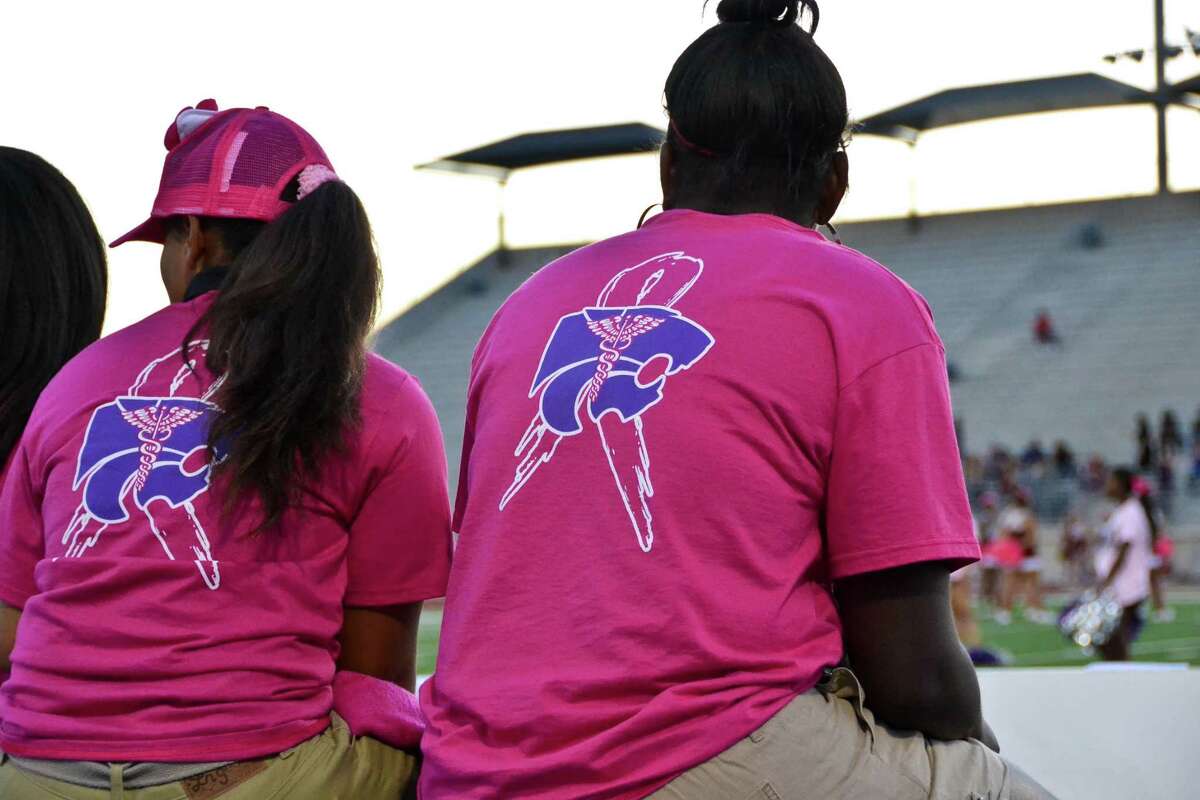 Humble's training staff wore commemorative t-shirts honoring the Wildcats' joint "Pink Out" night with Summer Creek during a football game between the two teams Oct. 20 at Turner Stadium.