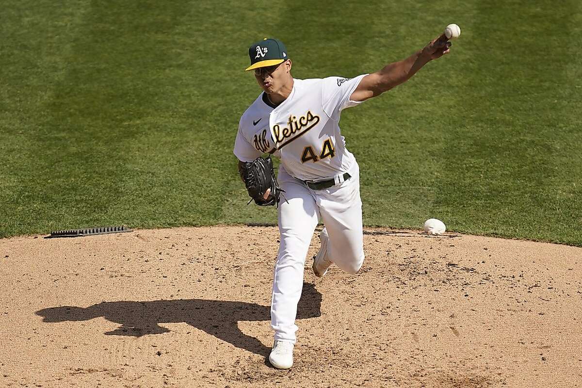 Oakland Athletics' Jesus Luzardo (44) pitches against the Chicago White Sox during the third inning of Game 1 of an American League wild-card baseball series Tuesday, Sept. 29, 2020, in Oakland, Calif.