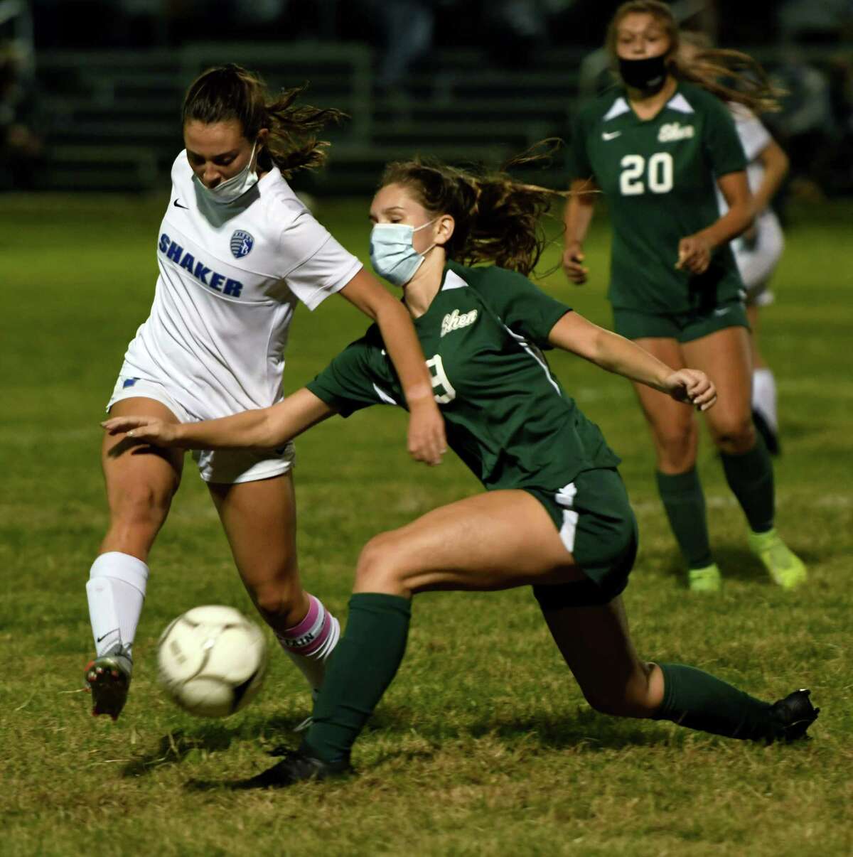 Shen's Mirabel Brunell attempts to block a pass by Shaker's KayLee Alix during a game Tuesday, Oct. 6, 2020, in Clifton Park(Jenn March, Special to the Times Union)