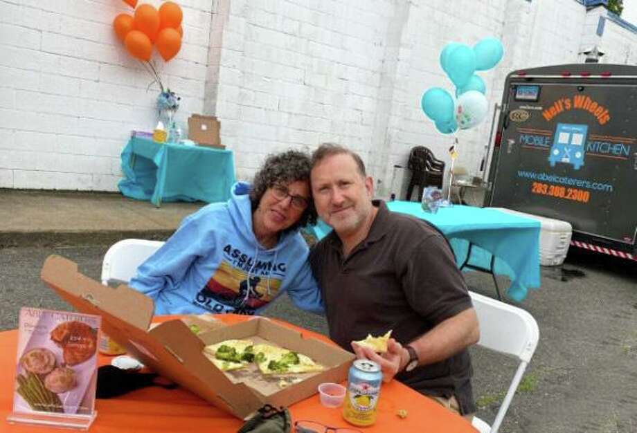 Rabbi Rona Shapiro of B’nai Jacob and David Franklin enjoying some food from Neil's Wheels. Photo: Melissa Rosado / Contributed Photo