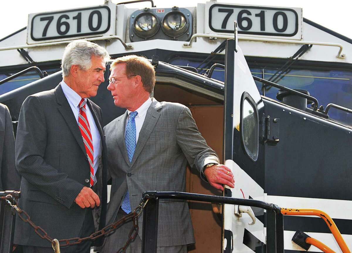 The late Senate Majority Leader Joseph Bruno, left and David Fink, president of Pan Am Railways aboard a locomotive following a news conference announcing the construction of an new rail terminal in Mechanicville Tuesday morning July 8, 2008. (John Carl D'Annibale/Times Union)