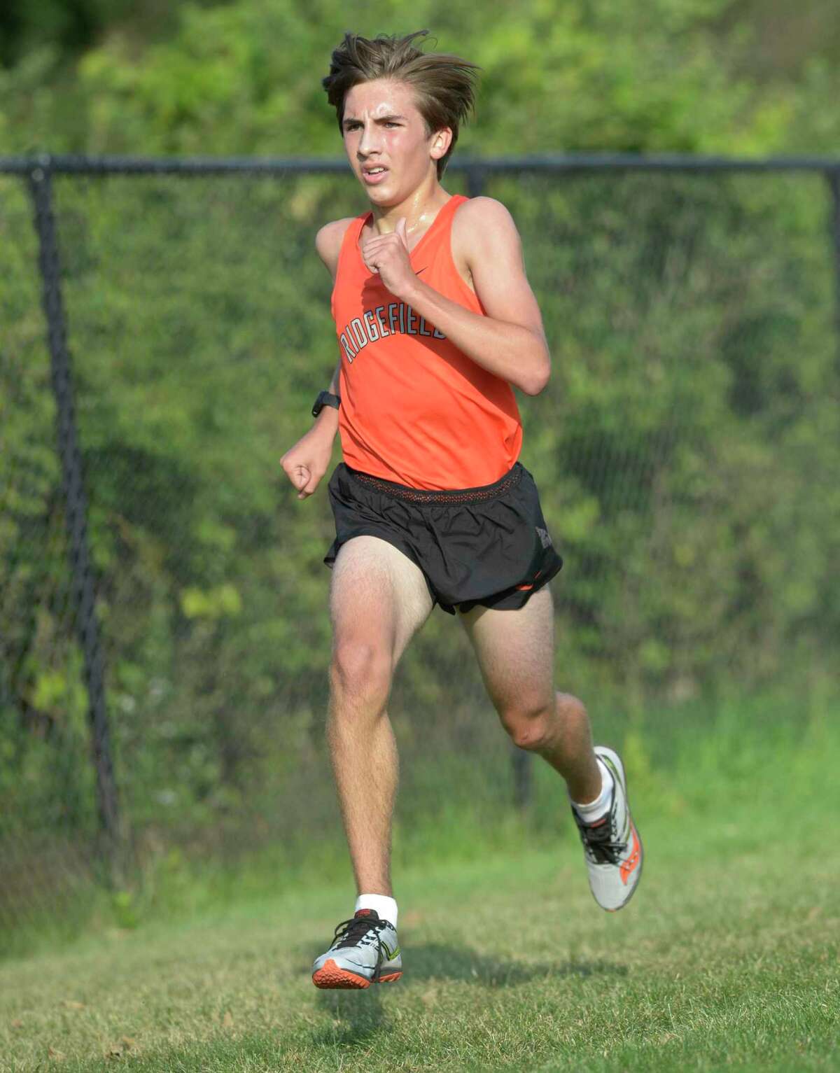 Matthew McDonough (shown in a meet last fall) was among the scoring runners as the Ridgefield boys cross country team defeated Staples on Tuesday.