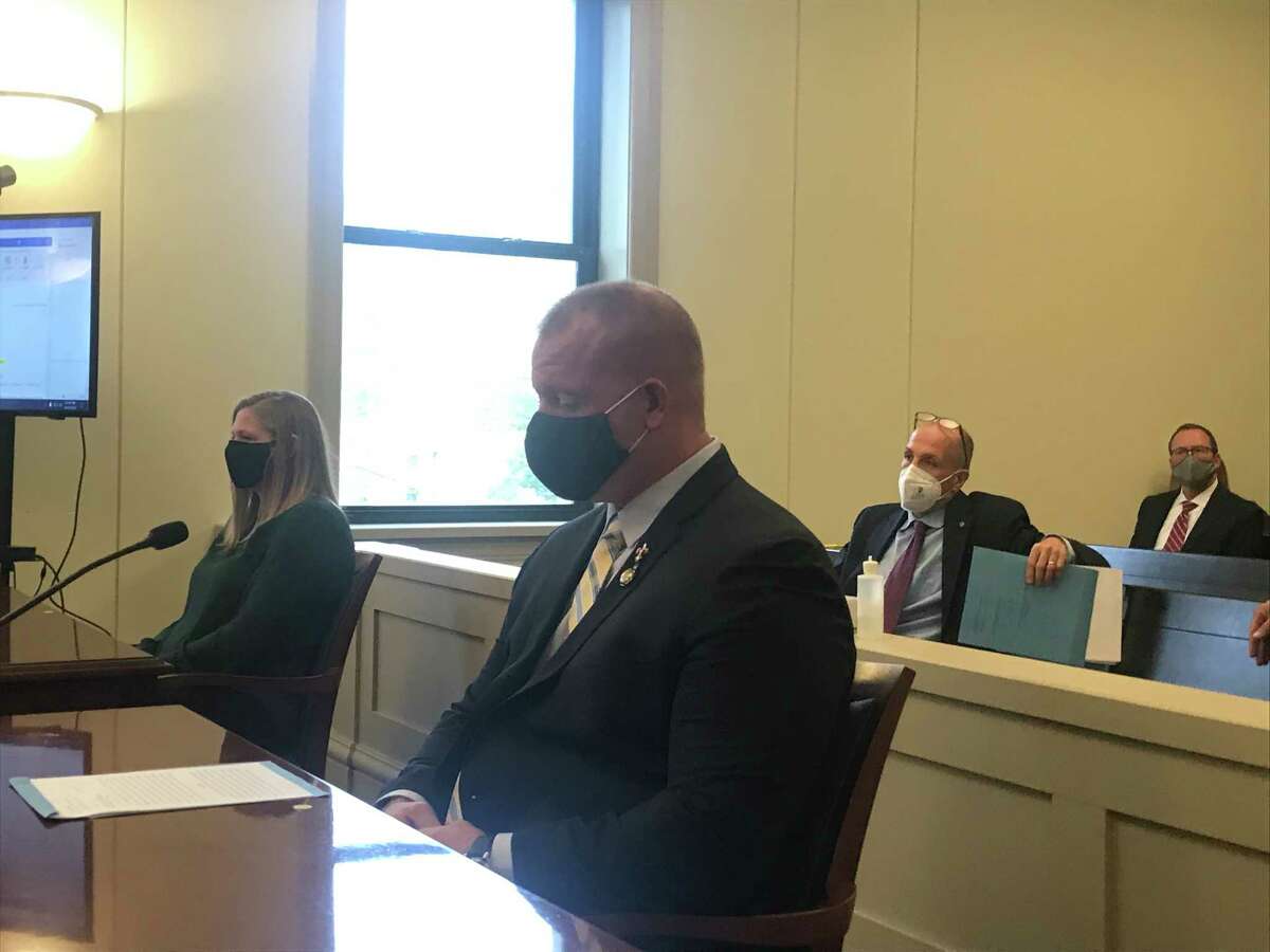 From left, Columbia County Deputy Kelly Rosenstrach and her husband Alex Rosenstrach, foreground, are arraigned in Columbia County Court in Hudson, NY, Wednesday Oct. 8, 2020 for second-degree gang assault and other charges.