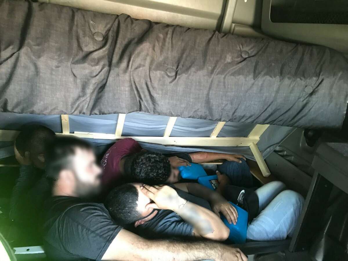 U.S. Border Patrol agents found several immigrants underneath the bed of a sleeper cab.