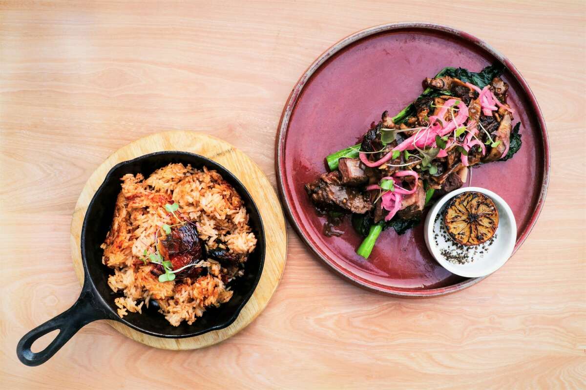 The Shake 'n Steak dish comes with Texas Waygu shaken beef with shiitake mushrooms, pickled onion, grilled Chinese broccoli, roasted tomato rice and an accompanying side of lemon pepper salt.