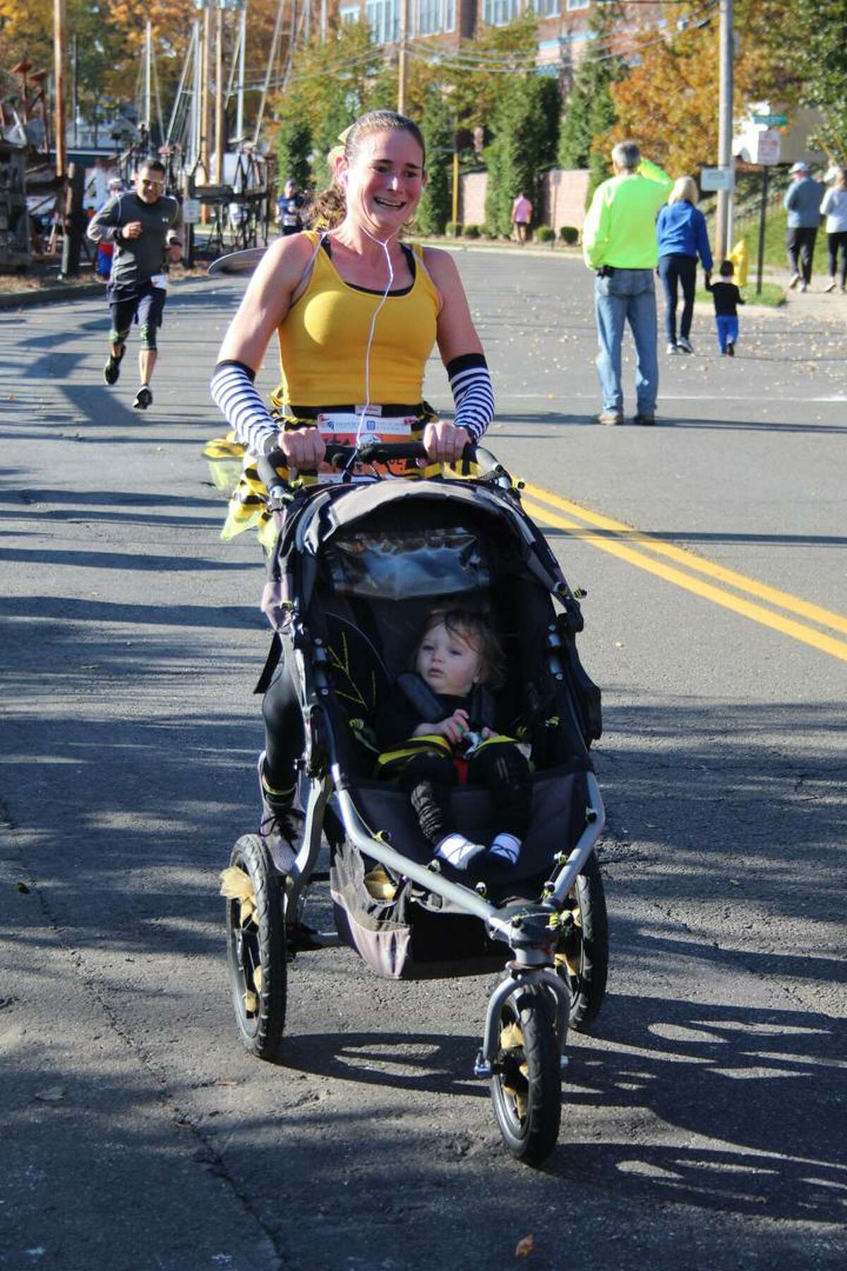 Families and individuals dressed up in costume while they ran in the 2019 Milford Trick or Trot 5K fundraiser for the Beth-El Center homeless shelter and soup kitchen.