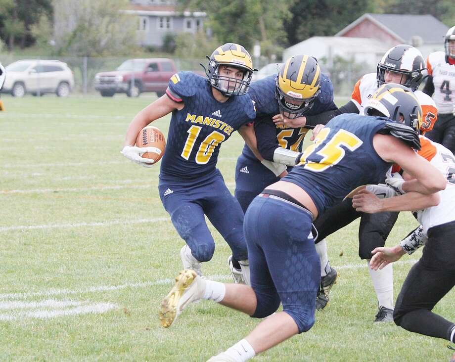 Manistee’s Trevor Mikula looks for room to run during the Chippewas’ victory over Harbor Springs on Saturday. Manistee will kick off with Muskegon Catholic Central at 7 p.m. on Friday at Chippewa Field. Photo: Dylan Savela/News Advocate