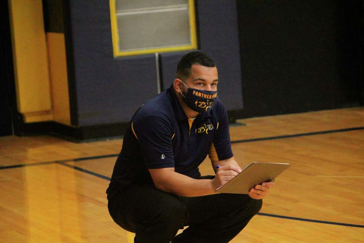 Baldwin volleyball coach Duane Roberts keeps an eye on the action during a home match last week. (Star photo/John Raffel)
