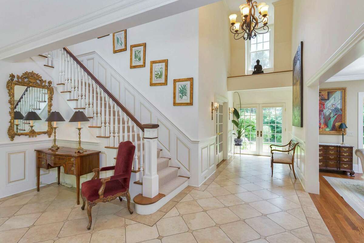 Located in the private, gated Chieftans Association, 13 Chieftans Road is a four-bedroom stone-and-shingle colonial with a two-car garage. The home’s front-to-back entry hall is tiled in limestone, warmed from beneath by a radiant-heat installation. The property is currently available to rent ($19,000/mo) or sale ($3.295 million); Coldwell Banker Realty’s Barbara Zaccagnini represents the seller.