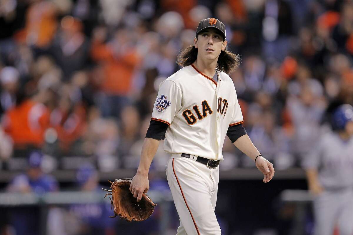 Giants pitcher Tim Lincecum, who led the National League in strikeouts in 2010, heads for the dugout during Game 1 of the 2010 World Series against the Texas Rangers at AT&T Park. Lincecum pitched 5 ⅔ innings, earning the win at the Giants prevailed 11-7.