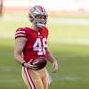 San Francisco 49ers long snapper Taybor Pepper (46) stands on the field  with punter Mitch Wishnowsky (18) before an NFL football game against the  Tampa Bay Buccaneers, Sunday, Dec.11, 2022, in Santa