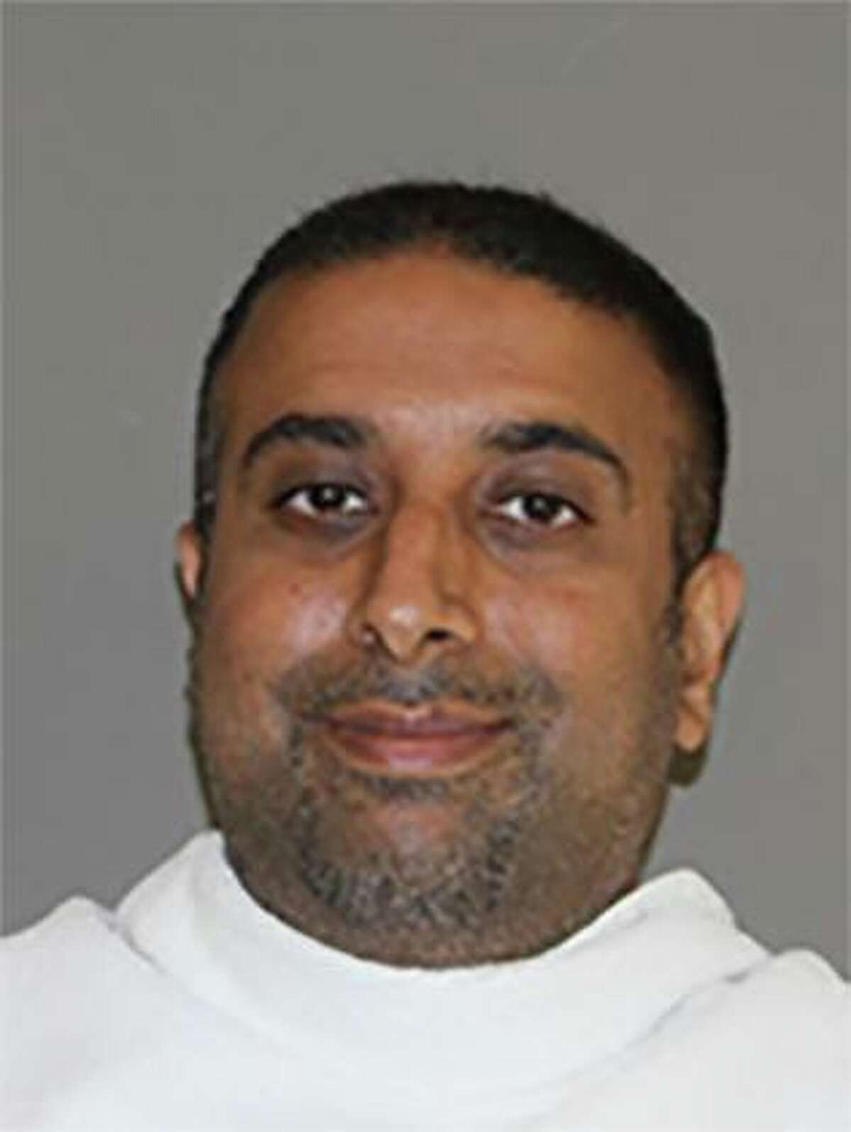 Zul Mirza Mohamed, a Carrollton mayoral candidate, was arrested on Oct. 7 and charged with more than 100 felonies related to voter fraud.