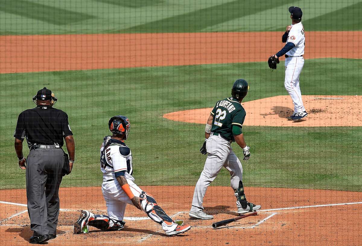 LOS ANGELES, CALIFORNIA - OCTOBER 08: Ramon Laureano #22 of the Oakland Athletics hits a three run home run against Zack Greinke #21 of the Houston Astros during the second inning in Game Four of the American League Division Series at Dodger Stadium on October 08, 2020 in Los Angeles, California. (Photo by Harry How/Getty Images)