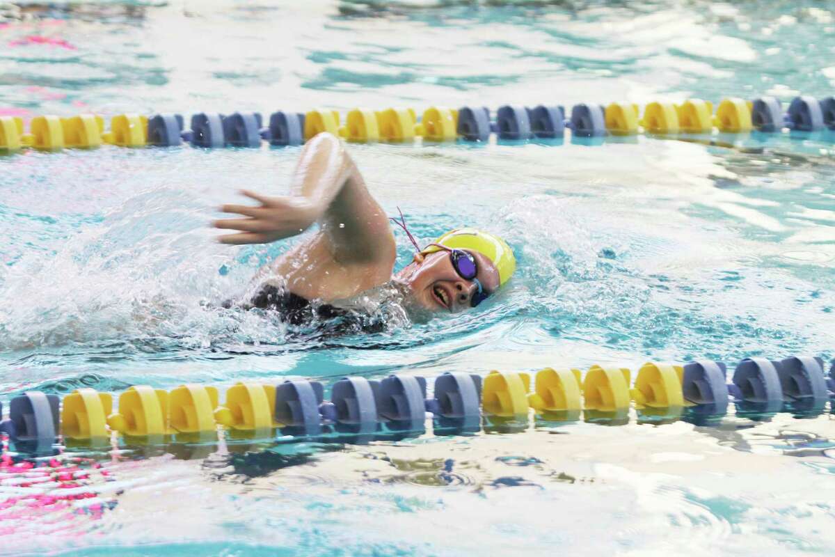 Manistee's Lauren Mezeske swims to victory in the 200-yard freestyle at the Paine Aquatic Center. (File photo)