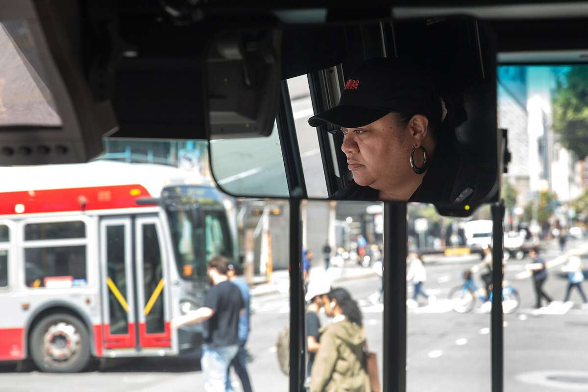 Diane Ulu drives the 14 Mission bus line along Mission Street.