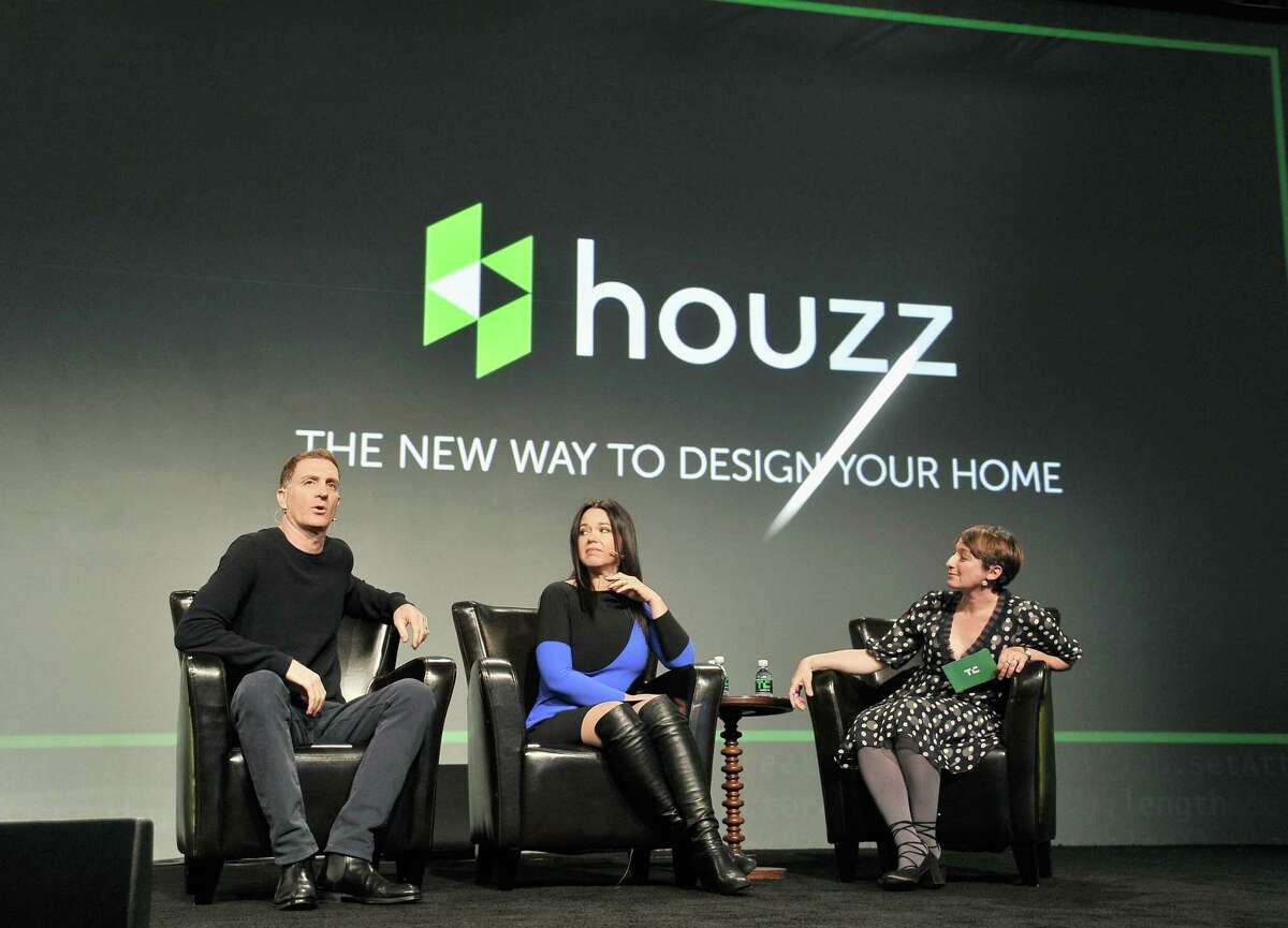 Houzz Co-Founder and President Alon Cohen, Houzz Co-Founder and CEO Adi Tatarko, and TechCrunch moderator Ingrid Lunden speak onstage during TechCrunch Disrupt SF 2017 at Pier 48 on Sept. 19, 2017.