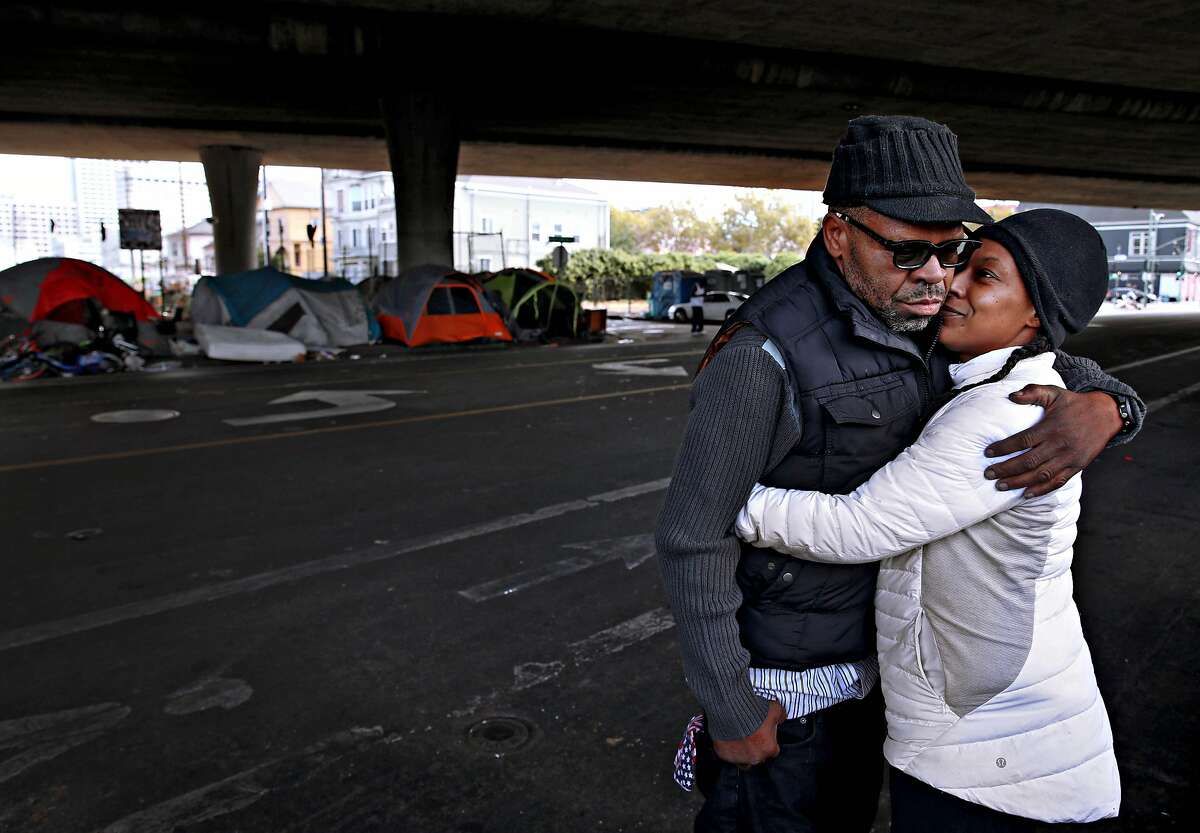 Raymond Joseph and pregnant fiancee Regina Carter live in an encampment off Martin Luther King Jr. Way in Oakland.