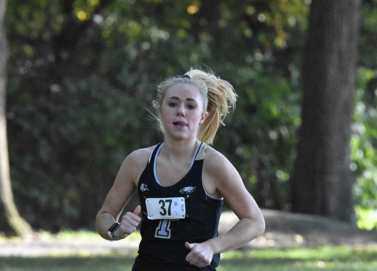 Junior Kali Holden broke an 11-year course record in the Eagles' dual-meet victory over Fairfeld Warde.