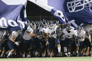 The Smithson Valley Rangers take the field for their football game against Wagner at Rutledge Stadium on Friday, Oct. 9, 2020.
