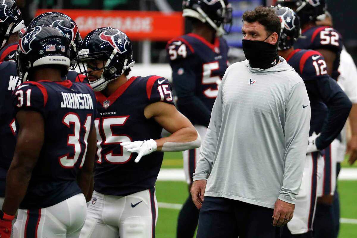 Houston Texans offensive coordinator Tim Kelly works with the offense before an NFL football game at NRG Stadium on Sunday, Oct. 11, 2020, in Houston.