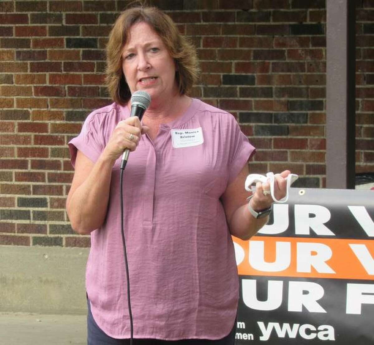 State Rep. Monica Bristow, D-Alton, addresses the YWCA of Alton’s Get out the Vote committee’s second Madison County Candidates Forum on Saturday in Alton’s Kilion Park. She also spoke about Illinois’ graduated tax amendment and Illinois House Speaker Michael Madigan.