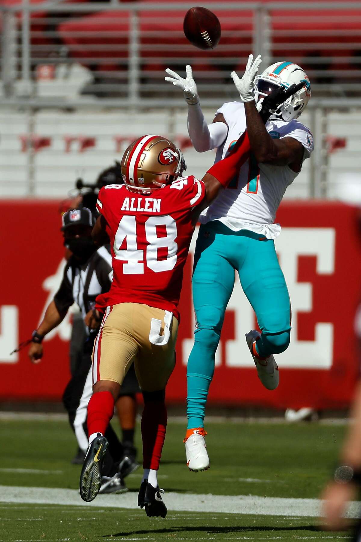 San Francisco 49ers' Brain Allen can't stop a catch by Miami Dolphins' DeVante Parker in 1st quarter during NFL game at Levi's Stadium in Santa Clara, Calif., on Sunday, October 11, 2020.