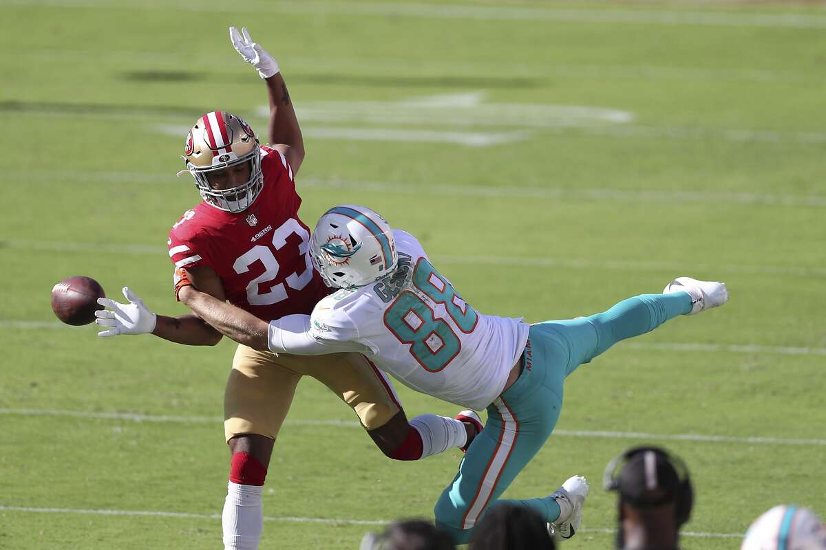 San Francisco 49ers cornerback Ahkello Witherspoon (23) is called for a penalty while defending Miami Dolphins tight end Mike Gesicki (88) during the second half of an NFL football game in Santa Clara, Calif., Sunday, Oct. 11, 2020.