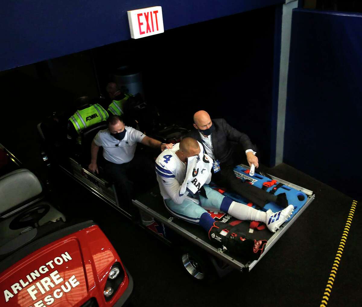 Dallas Cowboys quarterback Dak Prescott (4) is carted off the field after sustaining an ankle injury in the third quarter against the New York Giants on Sunday, Oct. 11, 2020 at AT&T Stadium Stadium in Arlington, Texas.