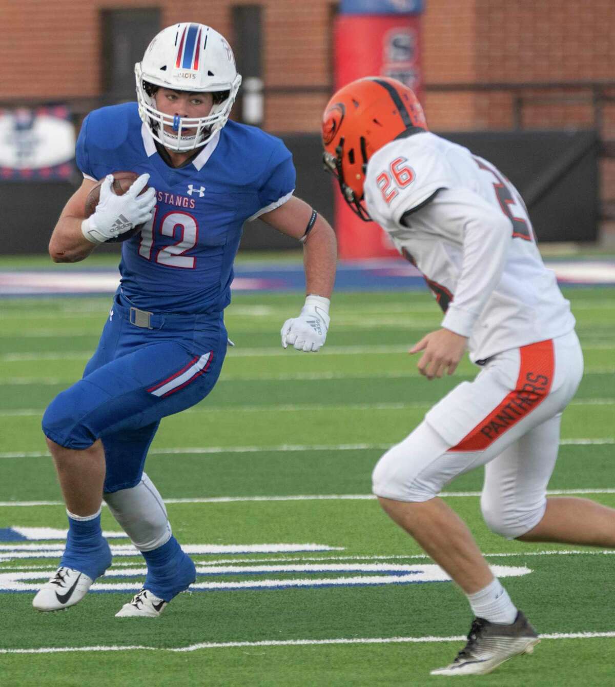 Midland Christian’s Rhett Clark looks to get past St. Pius’ Hayden Payne during last year’s playoff game. The Panthers have outscored opponents 138-20 in 2020.