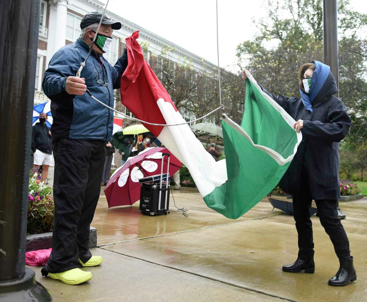 The rain couldn’t stop the St. Lawrence Society’s celebration of Columbus Day in October, as president Tod Laudonia and Town Ambassador at Large Bea Crumbine hoisted the Italian flag at Town Hall, and the coronavirus couldn’t stop the annual raffle. The Society Announced this week that the successful raffle, which was done in conjunction with the Columbus Day celebration, helped raise money for both Kids in Crisis and River House Adult Day Center.