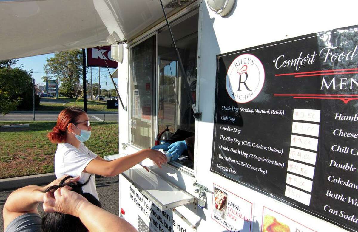 Riley's Kitchen, a food truck owned and operated by Melvin and Tanya Riley, parked at Kohl's parking lot in Orange, Conn., on Tuesday Oct. 6, 2020.