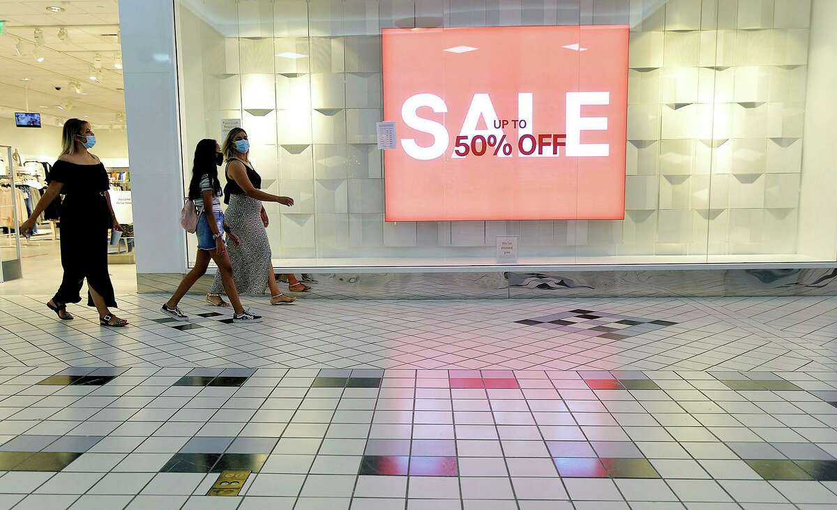 Shoppers walk through the Valley Mall in Halfway, Md., in August.