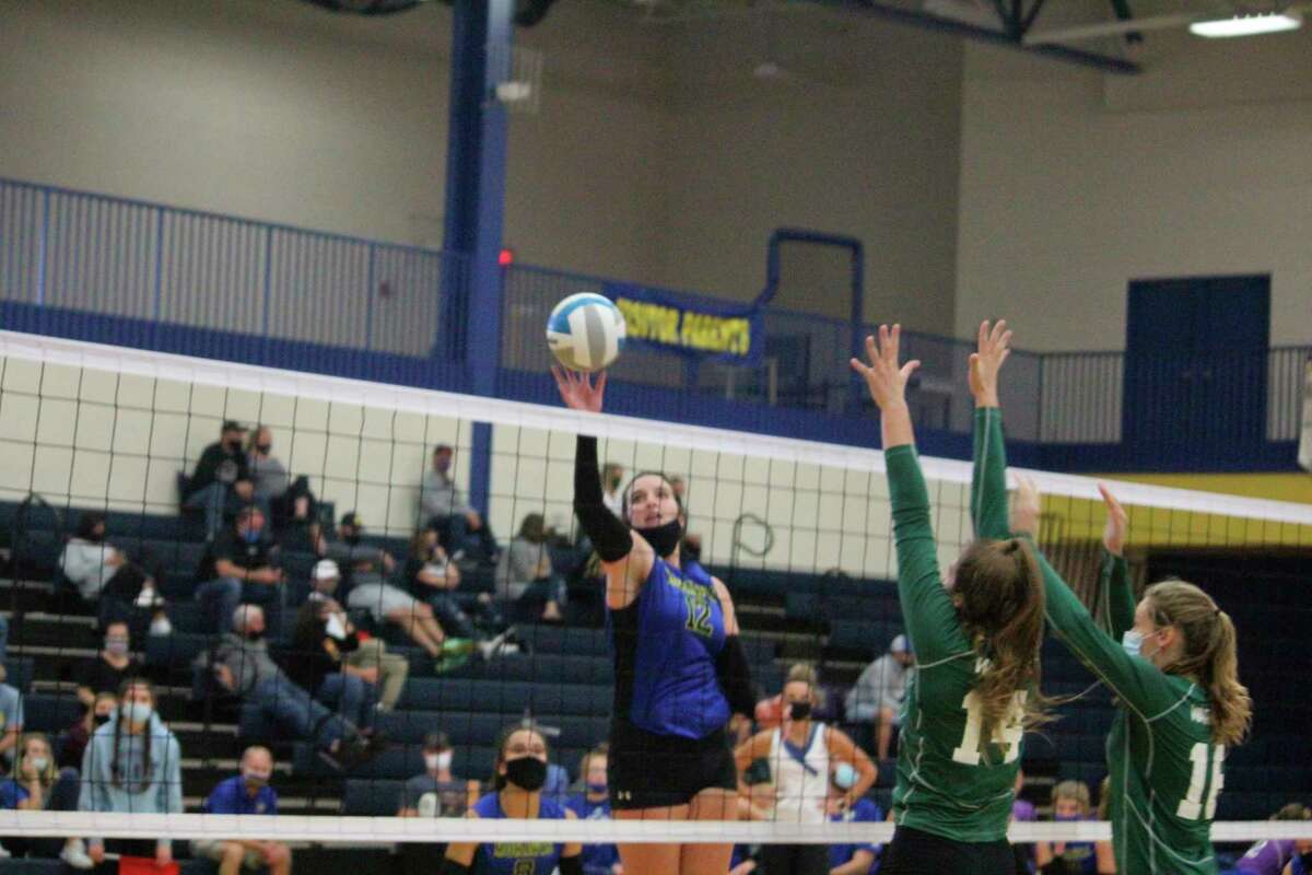 Morley Stanwood's Brooke Brauher goes up for the kill against West Michigan Christian on Friday. (Pioneer photo/John Raffel)